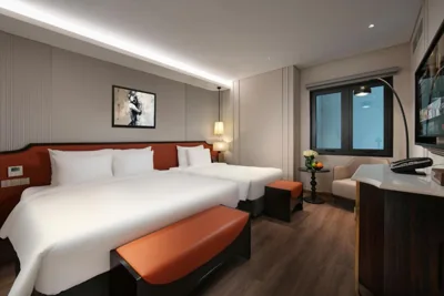 Deluxe Triple Room with Window — Le Premier Hotel & Rooftop Bar